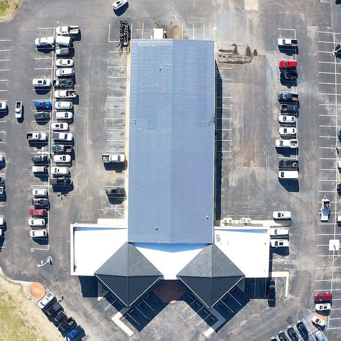 aerial view of new roof on auto dealership