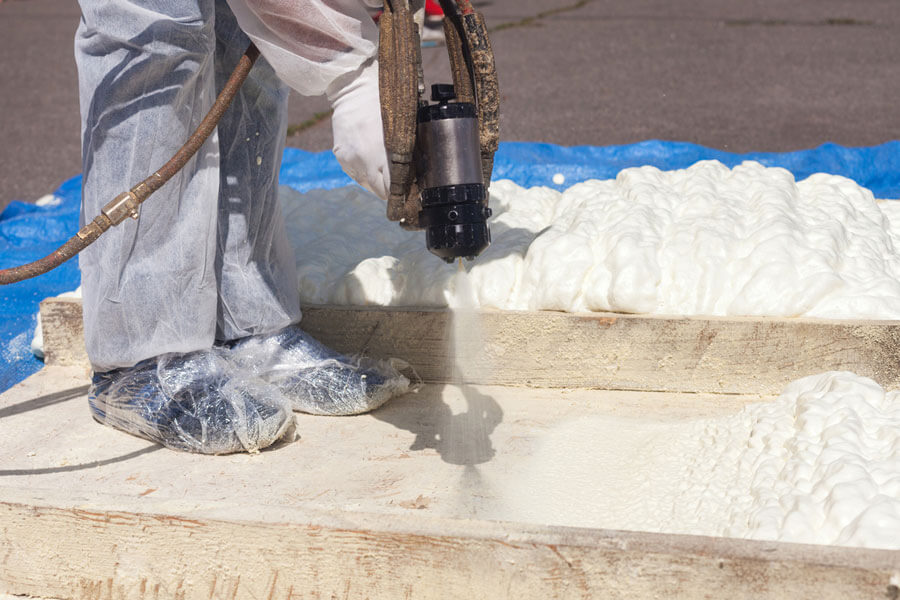 spray foam being installed on roof